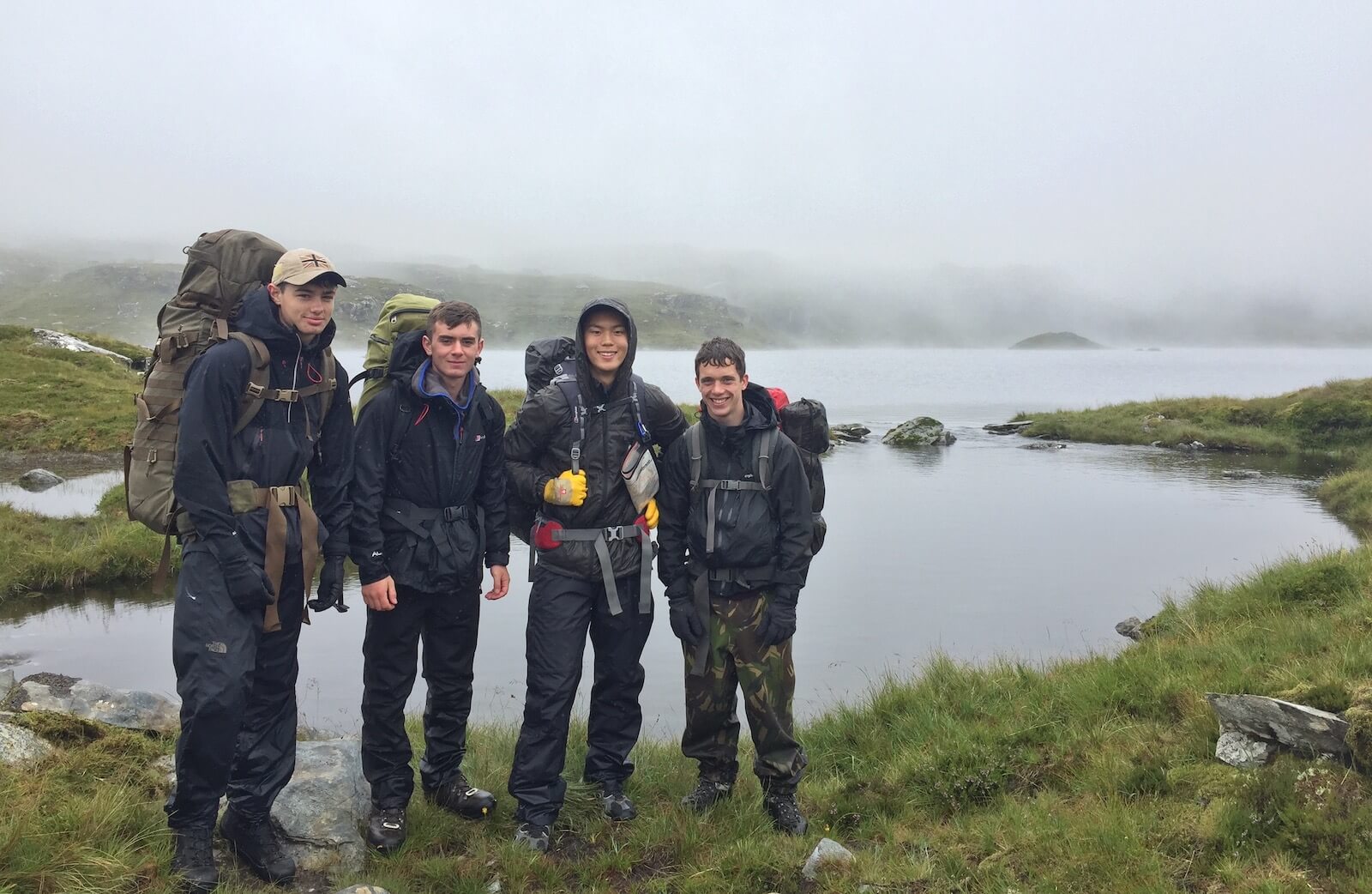 Young people learning to navigate in the mountains