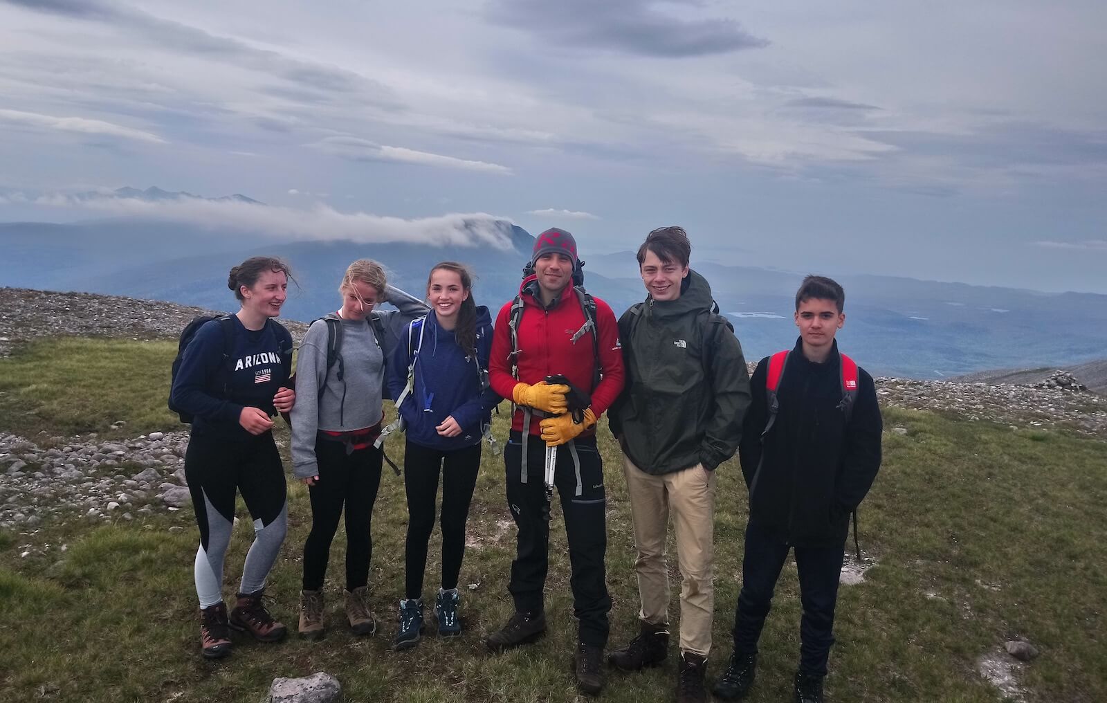 Young people climbing mountains in Scotland