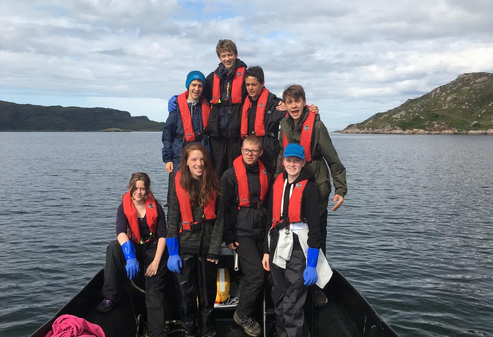 Summer camp head out in boats for lobster fishing