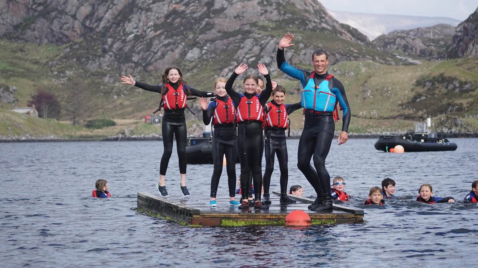 Children on a swimming raft