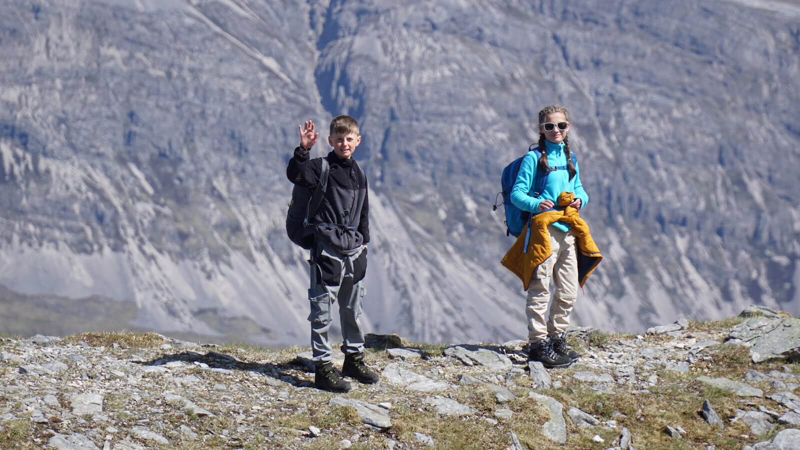 Two children on a mountain in Scotland