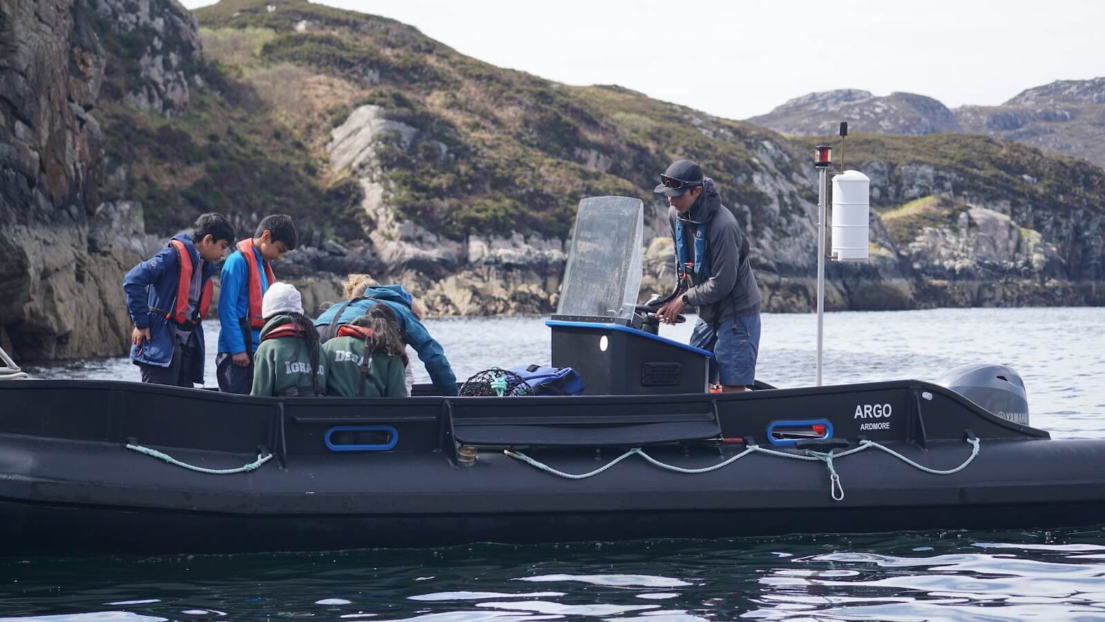 School children sea fishing