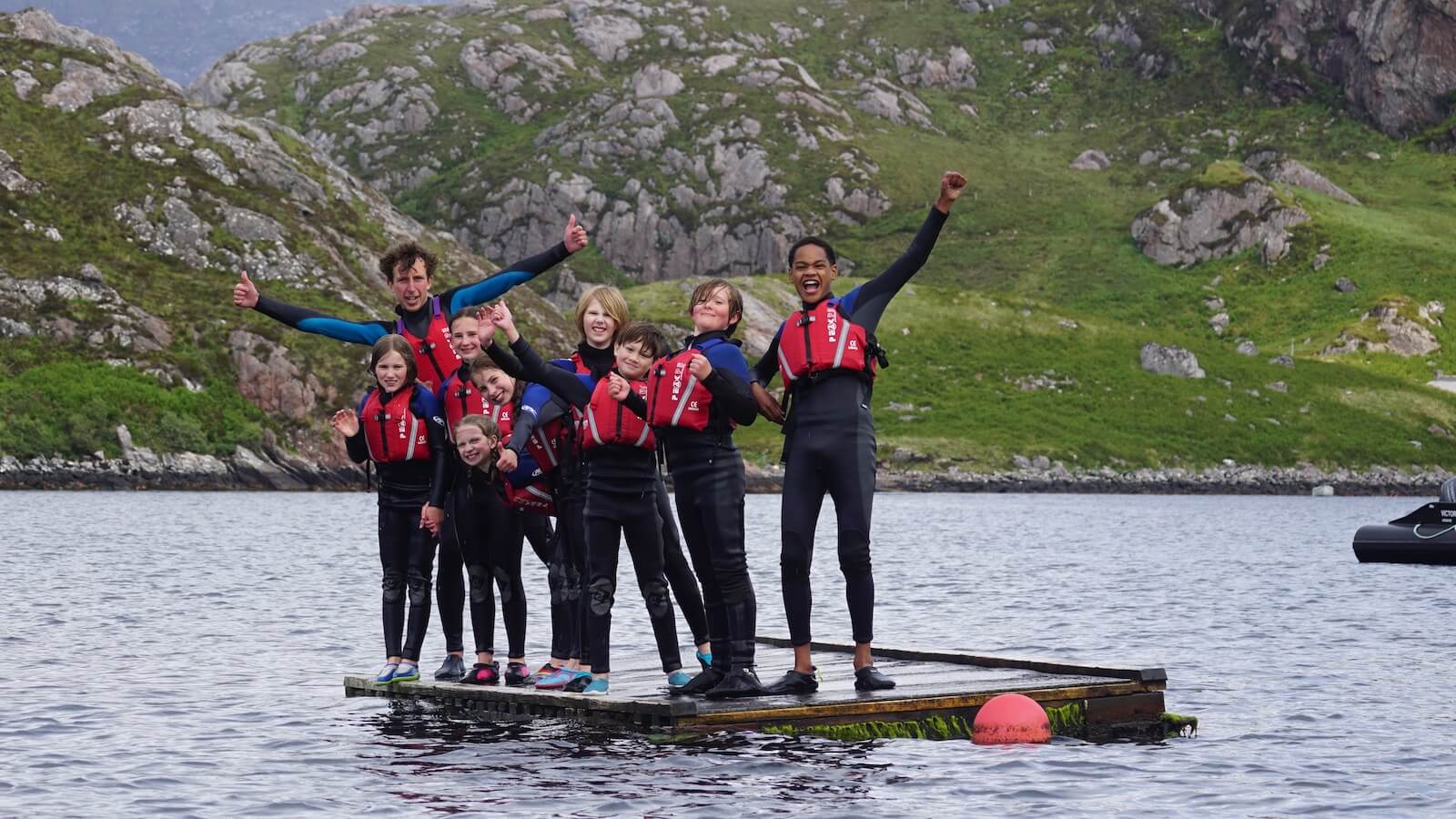 Children on a swimming raft